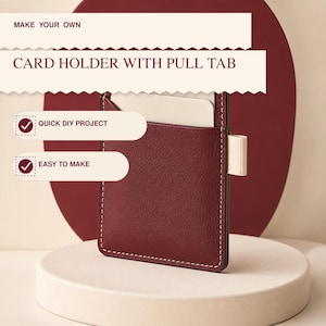 May include: A dark red leather card holder with white stitching and a beige pull tab. Text on the image reads: MAKE YOUR OWN CARD HOLDER WITH PULL TAB, QUICK DIY PROJECT, and EASY TO MAKE. The card holder has a rectangular shape with a slot.