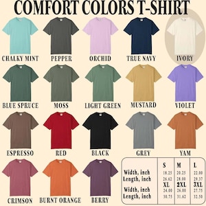 May include: A display of Comfort Colors t-shirts in various colors, including Chalky Mint, Pepper, Orchid, and True Navy. The image showcases a range of sizes and measurements in inches, with a size chart at the bottom. The shirts are arranged in rows.