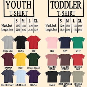May include: A display of youth and toddler t-shirts in various colors, including sport grey, black, and red. The image includes size charts with measurements in inches for width and length, ranging from 12 to 20 inches.