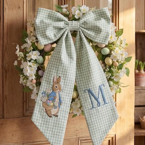 May include: A rustic wooden sign with the text "Welcome to our home" in white lettering. The sign features a distressed finish and a simple, inviting design, perfect for front door decor.