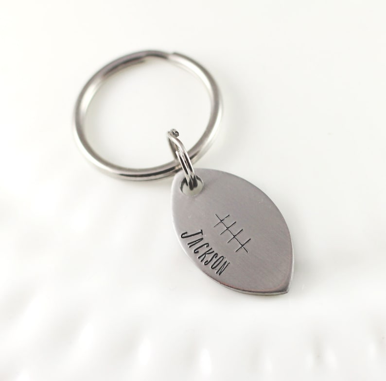 Football keychain Hand stamped keychain Football player Etsy