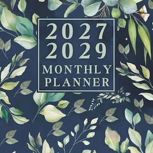May include: A monthly planner for 2027-2029 with a navy blue background and watercolor botanical design. The cover features the text "2027 2029 MONTHLY PLANNER" in a white rectangular frame, surrounded by green and white leaves.