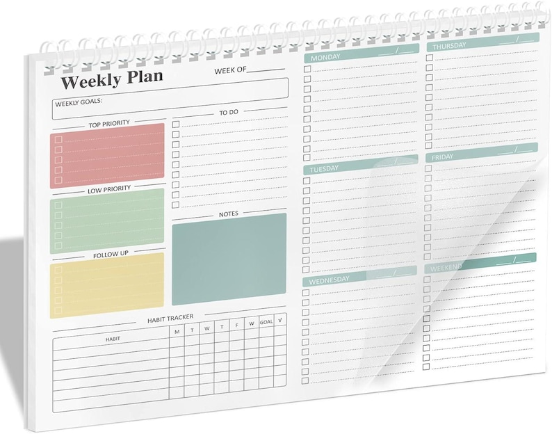 May include: A white spiral-bound weekly planner with a clear plastic cover. The planner features sections for weekly goals, to-do lists, and a habit tracker. Color-coded sections include red, green, and yellow for priority levels. The text "Weekly Plan" is printed at the top.