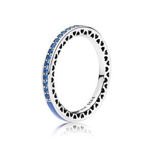 May include: A silver ring with a band of blue gemstones and a row of heart-shaped cutouts. The ring has a blue enamel accent and is marked with "S925 ALE".