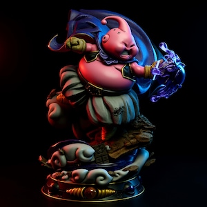 May include: A white ceramic mug with a black handle and the text "But First, Coffee" in a black, bold font. The mug is on a white surface.