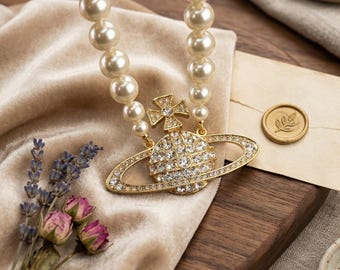 In Box 925 Silver CZ Saturn Pendant | Vivienne Westwood Pearl Necklace, Gifts