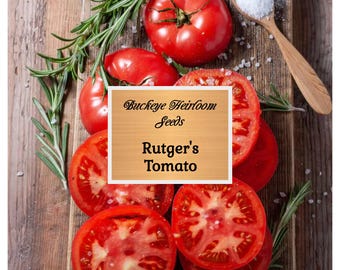 May include: A wooden surface displays fresh, red Rutgers tomatoes, some sliced, with sprigs of rosemary and a wooden spoon holding salt. A sign reads "Buckeye Heirloom Seeds" and "Rutger's Tomato".