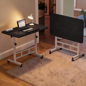 May include: A rustic wooden sign with the text "Welcome to our home" in white lettering. The sign has a distressed finish and a simple, inviting design, ideal for front door decor.