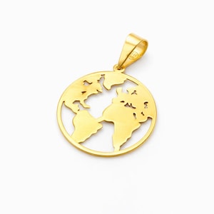 May include: A gold-coloured pendant depicting the Earth, with continents cut out. The pendant has a loop at the top for a chain. The design is a simple, elegant representation of the globe.