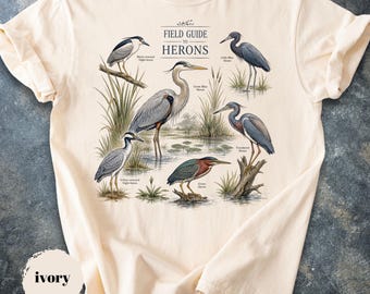 フィールドガイド サギTシャツ、ヴィンテージアイボリーバードウォッチングTシャツ、湿地の鳥の自然グラフィックユニセックスシャツ、サギ好きへのギフト、バードウォッチャートップス