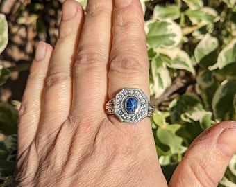 Medieval signet ring, based on the ring of the black prince, with a created blue star Sapphire.