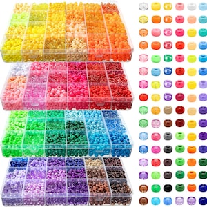 May include: A collection of colorful pony beads in a variety of colors, including yellow, orange, pink, red, green, blue, purple, and brown. The beads are organized in clear plastic containers with multiple compartments, and are ideal for crafting and jewelry making.