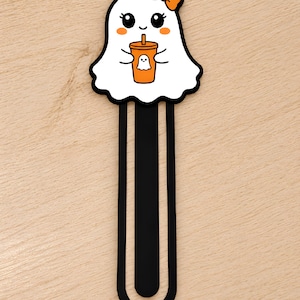 Cute girl ghost 3D printed bookmark with orange bow, orange cheeks, and ghost-themed drink cup.