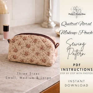May include: A quilted floral makeup pouch with a brown zipper and handles. The pouch is beige with a floral pattern in shades of pink and brown. Text on the image reads "Quilted Floral Makeup Pouch Sewing Pattern" and "Three Sizes: Small, Medium & Large."