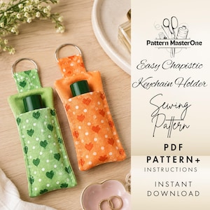 May include: Two fabric keychain holders for lip balm, one green with white hearts and one orange with white hearts, each featuring a metal ring. The text reads Pattern MasterOne Easy Chapistic Keychain Holder Sewing Pattern PDF PATTERN+ INSTRUCTIONS INSTANT DOWNLOAD.