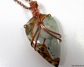 Picasso jasper wire wrapped pendant necklace, fabulous arrowhead shaped blue, gold and brown colored stone wire wrapped in copper