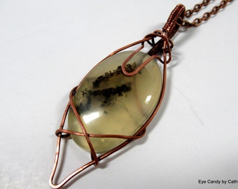 Gorgeous prehnite pendant, wire wrapped with square copper wire and finer copper wire, hung from a beautiful copper chain