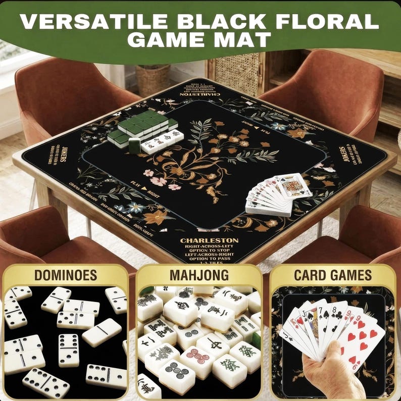 May include: A square black game mat featuring a gold floral pattern and printed text for Mahjong, dominoes, and card games. The mat displays game instructions and markings for Charleston, play directions, and jokers, with white tiles and playing cards.