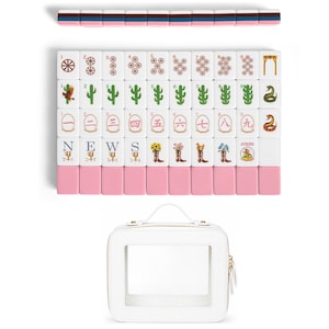 May include: A set of white mahjong tiles with pink backs, featuring colorful illustrations of cacti, snakes, boots, flowers, and Chinese numerals. The tiles are arranged in rows and columns, accompanied by a white square carrying case with a clear window.