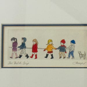 May include: Watercolor print of children holding hands, walking in a line, and a small dog. The children are wearing coats and hats in various colors. The text "The Field Trip" is below the image.