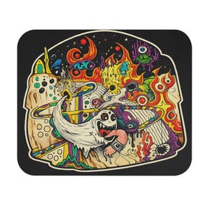 May include: A vibrant, psychedelic illustration on a black square coaster. The artwork depicts a cartoon ghost with a long tongue, amidst swirling planets, flames, and a starry backdrop. The design is rich with red, yellow, purple, and green hues.