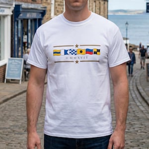 May include: A white ceramic mug with a black handle and the text "But First, Coffee" in a handwritten style. The mug is on a white surface. Suitable for hot drinks.