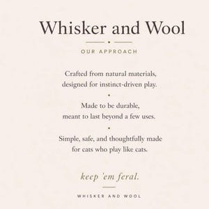 May include: A cream-colored graphic with the text "Whisker and Wool" at the top. The text below describes the brand's approach: crafted from natural materials, designed for instinct-driven play, durable, safe, and thoughtfully made for cats.