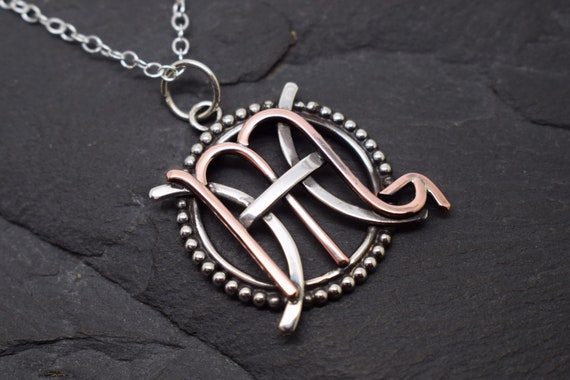 Scorpio Pisces Necklace Sterling Silver and Oxidised Copper with Beaded Edging Combined Zodiacs