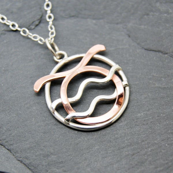 Aquarius taurus necklace sterling silver and polished copper combined zodiacs