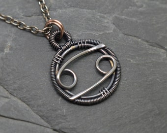 Cancer necklace wire wrapped in oxidised copper zodiac