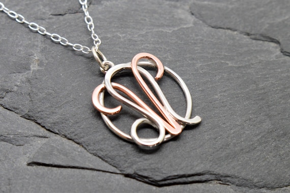 aries and leo necklace