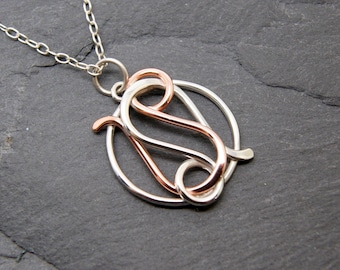 Leo Leo necklace sterling silver and polished copper combined zodiacs