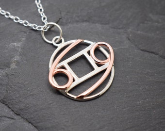 Gemini cancer necklace sterling silver and polished copper combines zodiacs