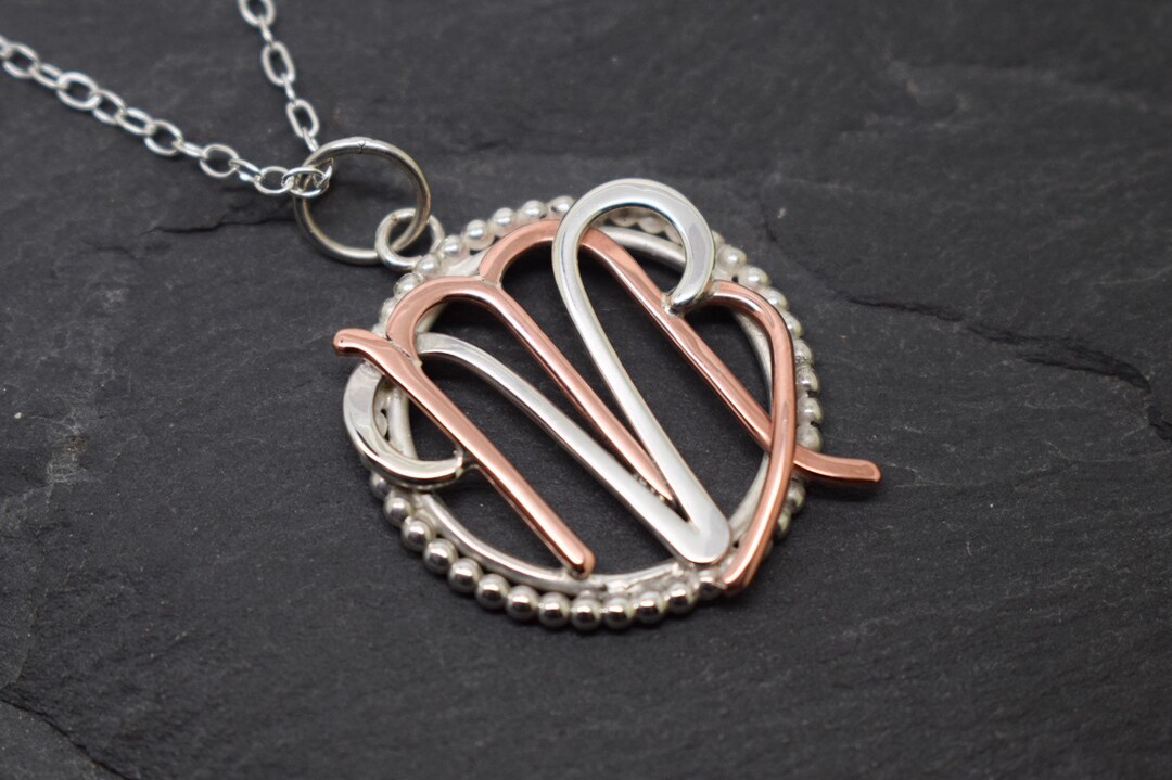 Aries Virgo Necklace Sterling Silver and Copper With Beaded Edging