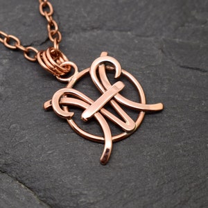 Miniature Aries Pisces necklace polished copper combined zodiacs pendant image 1