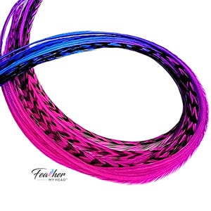 Close up of Summer Berry rainbow tie dye hair feathers in pink purple and blue
