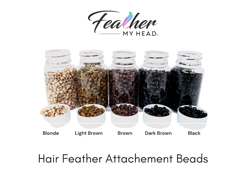May include: Five clear plastic bottles filled with small, round, hair feather attachment beads in five different colors: blonde, light brown, brown, dark brown, and black. The bottles are labeled with the color of the beads. The text "Feather MY HEAD." is at the top of the image. The text "Hair Feather Attachement Beads" is at the bottom of the image.