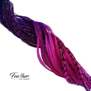 Heat safe Summer Berry feather hair extensions curled in pink purple and blue rainbow tie dye colors