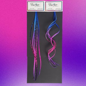 Packaged Summer Berry feather hair extensions in pink purple and blue with styled display sample