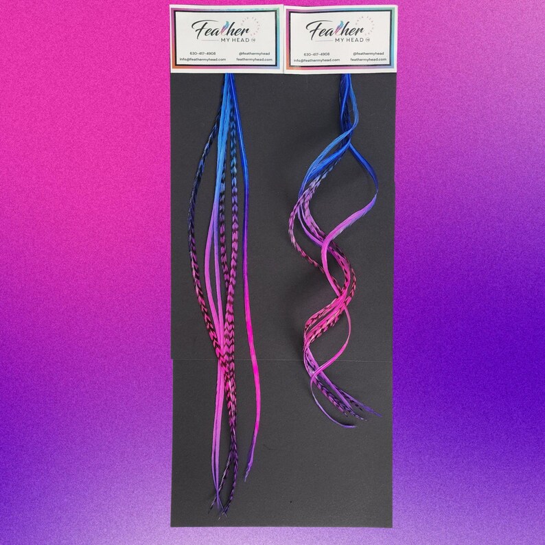 Packaged Summer Berry feather hair extensions in pink purple and blue with styled display sample