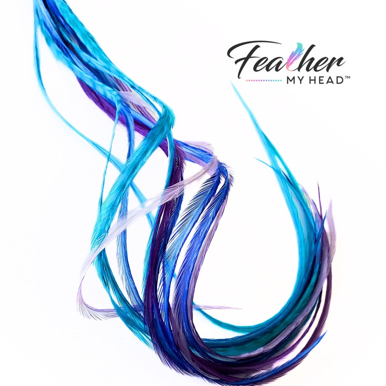 Hair Feather Extensions in colors of blue purple and turquoise. Long hair feathers with a optional feather kit which includes attachment beads, instructions and tool to pull hair through micro bead.