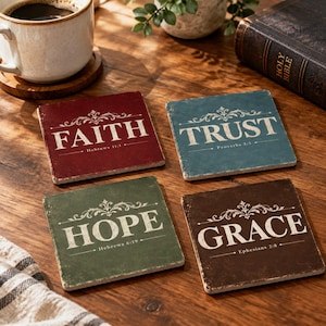 May include: A set of four square coasters in red, blue, green, and brown, each featuring a distressed finish and white text. The coasters display the words FAITH, TRUST, HOPE, and GRACE, accompanied by their respective Bible verse references.