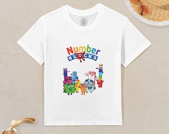 Camiseta para niño / Diseño divertido de Numberblocks. Personajes vibrantes y el logotipo de la serie muestran moda educativa de dibujos animados.