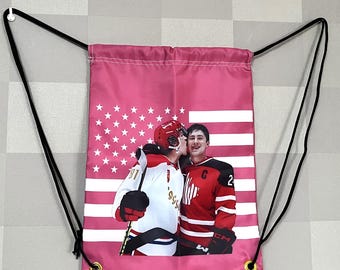 Heated Rivalry Pink Flag Drawstring Bag – Queer Hockey Romance Book Merch 12'' x 18''