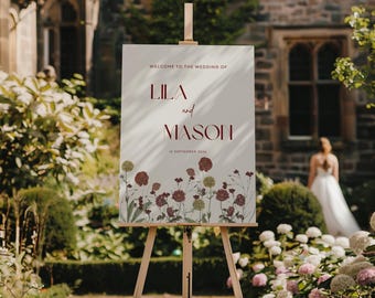 Letrero de bienvenida para boda con flores silvestres de color rosa polvoriento, plantilla editable de Canva (tamaño A2 imprimible)