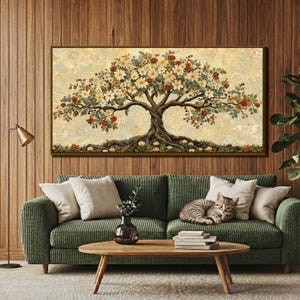 May include: A framed canvas art piece depicting a detailed tree with a sprawling trunk and branches filled with cream and red flowers. The artwork is set against a light yellow background and is displayed above a green corduroy sofa.