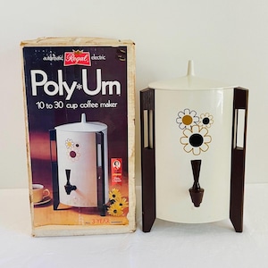 May include: Vintage Regal Poly*Urn electric coffee maker with original box. The white urn features brown accents, a spigot, and a floral design. The box displays the product name and a picture of the coffee maker.