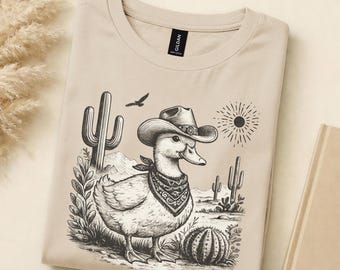 Vintage Cowboy Duck Shirt, Western Graphic Tee, Old West Animal Art T Shirt, Retro Desert Illustration Shirt, Unisex Americana Tee