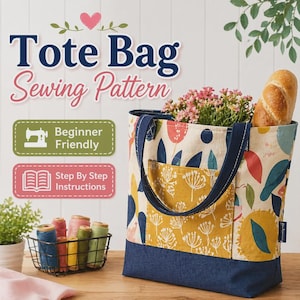 May include: A tote bag sewing pattern with a floral design, a navy blue base, and navy blue handles. The bag is filled with flowers and a loaf of bread. The image includes text that says "Tote Bag Sewing Pattern", "Beginner Friendly", and "Step By Step Instructions".