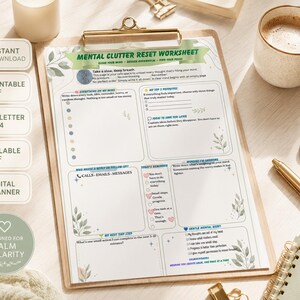 May include: A Mental Clutter Reset Worksheet printed on white paper, secured to a wooden clipboard. The document features green leaf illustrations, organized sections for daily tasks, reminders, and mental notes, with text headings including "Everything on my mind" and "My top 3 priorities."